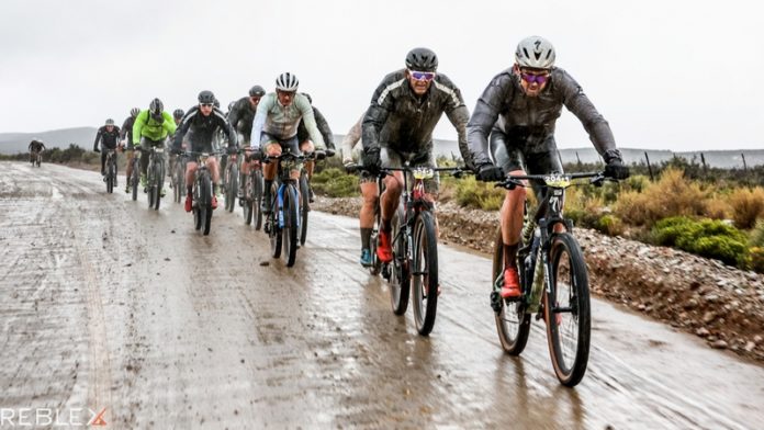 The Uncle Fish team of Nico Bell (front), Gawie Combrinck and Gerrit de Vries prevailed against the weather and their rivals to win the 2022 Trans Baviaans Race, from Willowmore to Jefferys Bay, on Saturday, 13 August. Photo by Llewellyn Lloyd / Reblex Pho