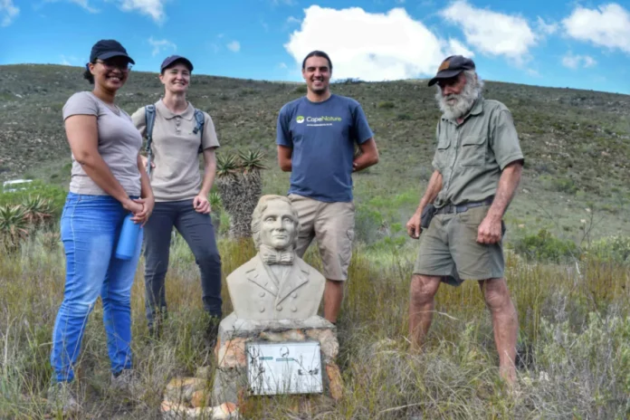 Team-of-CapeNature-and-landowners-standing-at-statue-in-Pietersrivier-Nature-Reserve_W1200_H800_Mcrop_upscale1_autofo